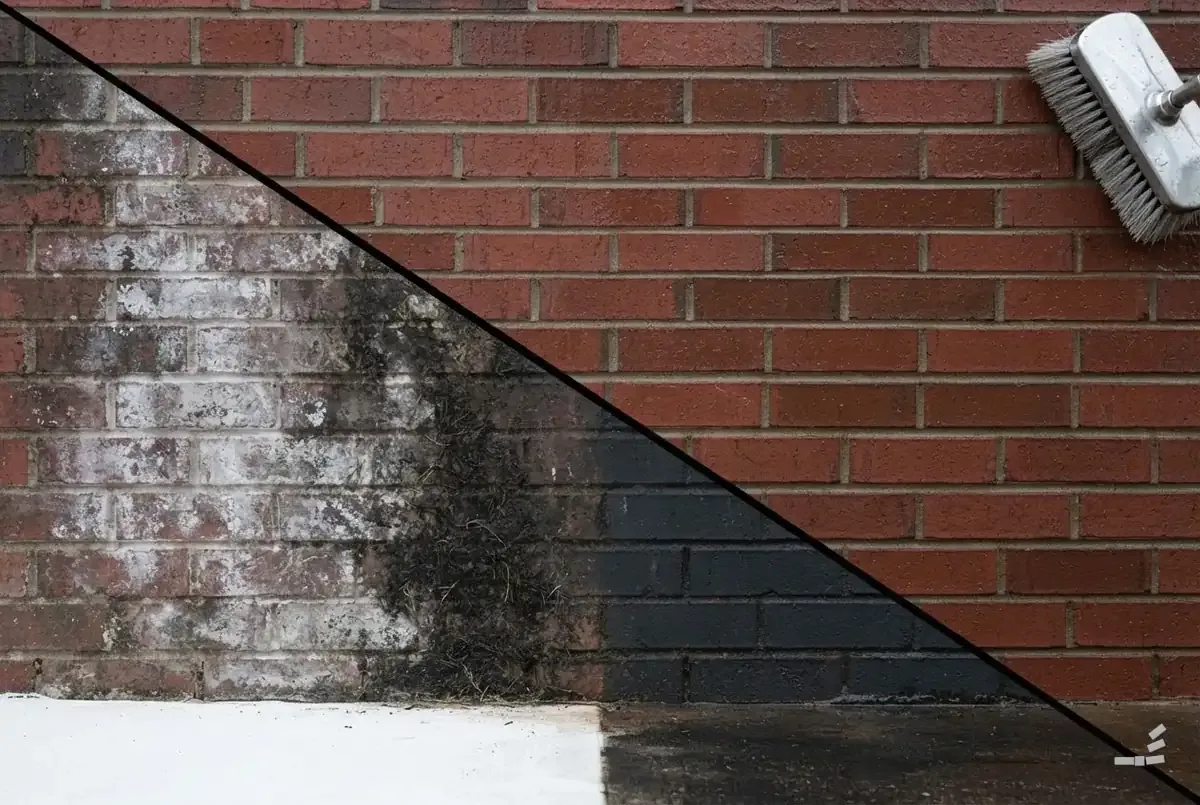 Photograph-style brick wall half cleaned along a diagonal — close detail