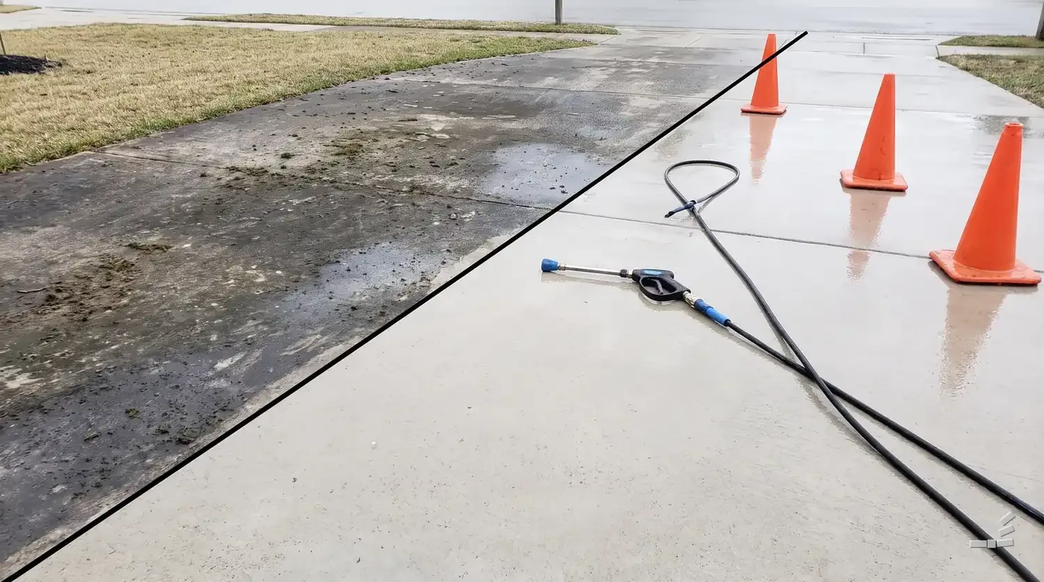 Photograph-style pressure washing job site with hoses and cones